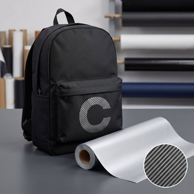 Film de transfert textile Chemica Carbon - Sac à dos noir personnalisé avec logo et rouleau de film à motif carbone diagonal pour marquage textile