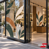 Décoration végétale élégante sur vitrine de magasin réalisée avec des films adhésifs couleur ORACAL 551